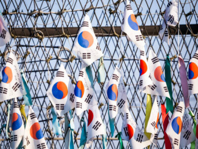 Korea  | Korean people come to DMZ area to hang on the the flags, bows, ribbons, making wish for they country and people to be united